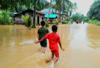 Kawasan Banjir di Desa Patiluban Hilir Kecamatan Natal, Minggu (11/12/2022).