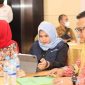 Wakil Bupati Mandailing Natal, Atika Azmi Utammi Nasution (Tengah) didampingi Kadis Kesehatan Madina, dr Faisal dan Kadis KB dan Pengendalian Penduduk Madina, Efi Muta'am saat menghadiri Rapat Koordinasi dan Evaluasi Percepatan Penurunan Stunting di Medan, Selasa (06/12/2022).