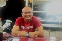 Kepala Dinas Perdagangan Pemkab Mandailing Natal, Parlin Lubis saat ditemui di salah satu warung di Kota Panyabungan. (Istimewa)