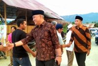 H. Zuhri Musthafa Nasution saat mendampingi kunjungan kerja abangnya H. Harun Musthafa Nasution, Wakil Ketua DPRD Sumatera Utara di Desa Rumbio, Selasa (13/6/2023).