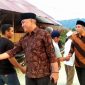 H. Zuhri Musthafa Nasution saat mendampingi kunjungan kerja abangnya H. Harun Musthafa Nasution, Wakil Ketua DPRD Sumatera Utara di Desa Rumbio, Selasa (13/6/2023).
