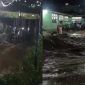 Kondisi jembatan diatas sungai Aek Singolot Desa Purba Baru saat arus deras meluap, Rabu (20/12/2023).
