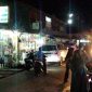 Suasana di Jalan Lintas Barat Pasar Baru Panyabungan pada pukul 21.30 WIB, Minggu (7/4/2024).