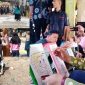 Anak-anak sedang memainkan engrang, tamtam buku, kelereng dan Wakil Bupati Madina ikut mewarnai di Festival Permainan Leluhur Kec. Tambangan, Kamis (6/6/2024). [Foto: Joki Nasution]